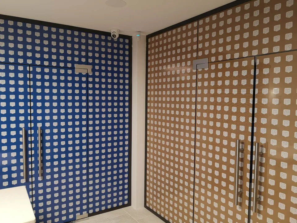 Glass doors with a decorative patterned printed film